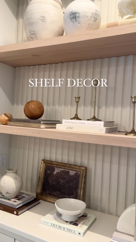 Shelf decor, bookcase shelves, coffee table books, home decor // 

#LTKhome #LTKstyletip #LTKfindsunder50