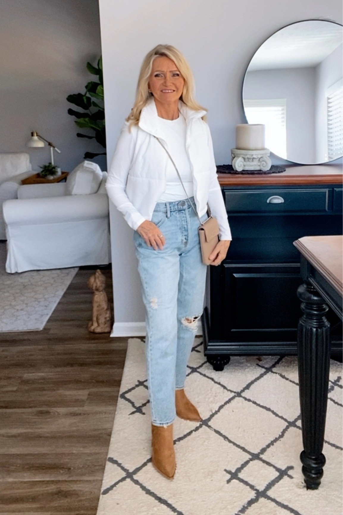 Out and About outfit. Cropped white puffer vest/white tee/ jeans/short boots #casualoutfits #jeans #puffervest #tees

#LTKSaleAlert #LTKFindsUnder50 #LTKStyleTip