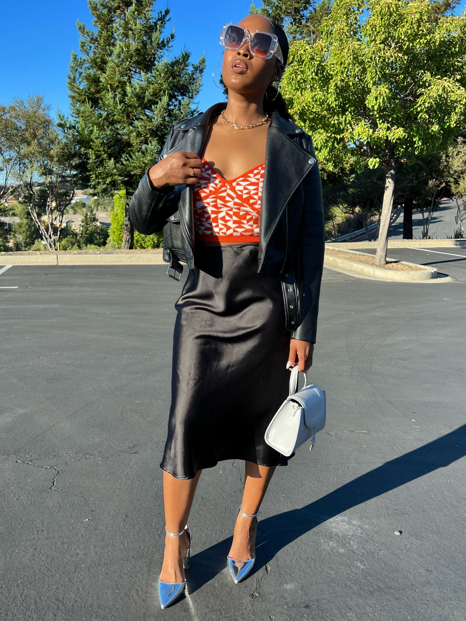 Black slip skirt + a pop 🧡

#LTKshoecrush #LTKstyletip #LTKunder100