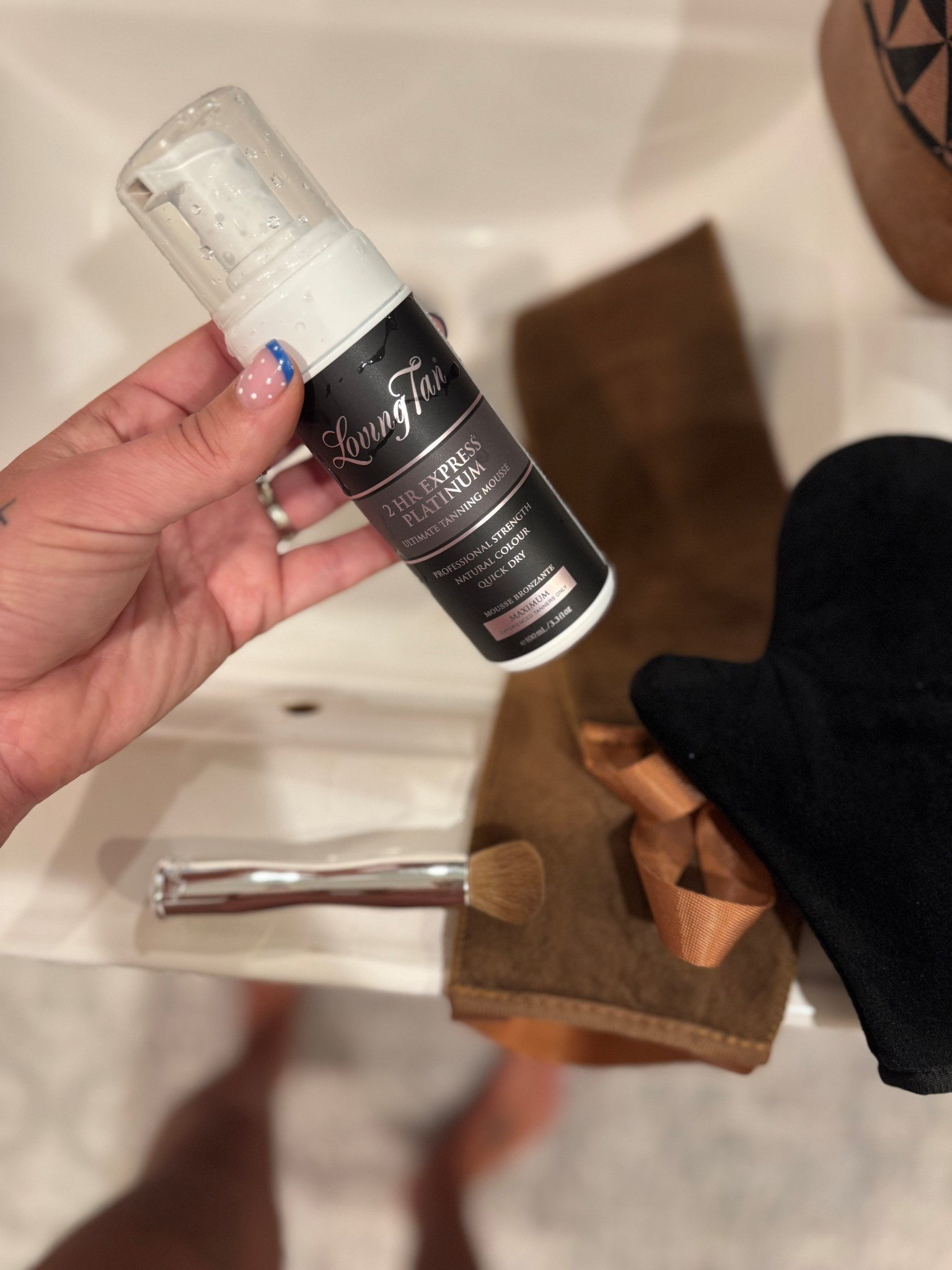 Adding a little mood boost via self tanner today. 🤎
I’ve been using this brand for 5 years and it is hands down my fave! I recently started using this 2 hour express last year & fell in love. Not only does it look so good & stays dark without looking extra fake, but it also processes in only 2 hours so I’m not spending an entire day waiting to wash it off.
It also keeps developing a little after you’ve rinsed , giving a nice, deep bronzed glow!

I like to use this platinum one, the darkest one they have, but they also have the express in medium & dark. 
My mitt is old but the one they have has no finger , which is even better for switching back & forth between hands. 
This brown strip you see here is what I use to apply tanner to my back… because how else do you reach all those hard to reach places when you’re home alone?!
I also like to use a brush to contour my face a little with tanner, as well as brush down onto my hands to keep them looking a little more natural (the hands are always where you can tell with tanner I feel like. Sometimes I get it just right with this brush, other times I’m a little messy, but I’m also past the point of caring lol)

TIP FOR BEST APPLICATION : with this product I think it blends best if you rub it all on & then pat it into the skin (kind of like a slow deep pat/press if that makes sense) to lock it in . 

They have a CUTE new look with their packaging & I’ve included all that plus more for ya on this post too! 

#LTKBeauty #LTKgrwm #LTKselfcare