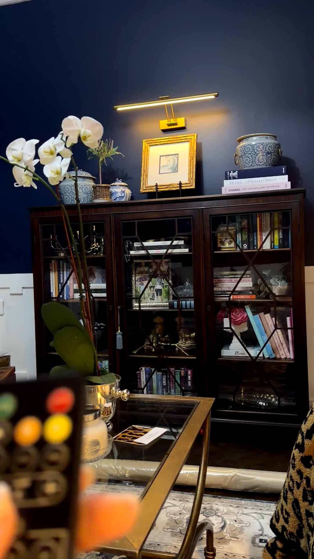 I finally added a picture light and I don’t know why I waited so long… it instantly made this space feel finished.

#LTKvlog #LTKstorytime #LTKHome