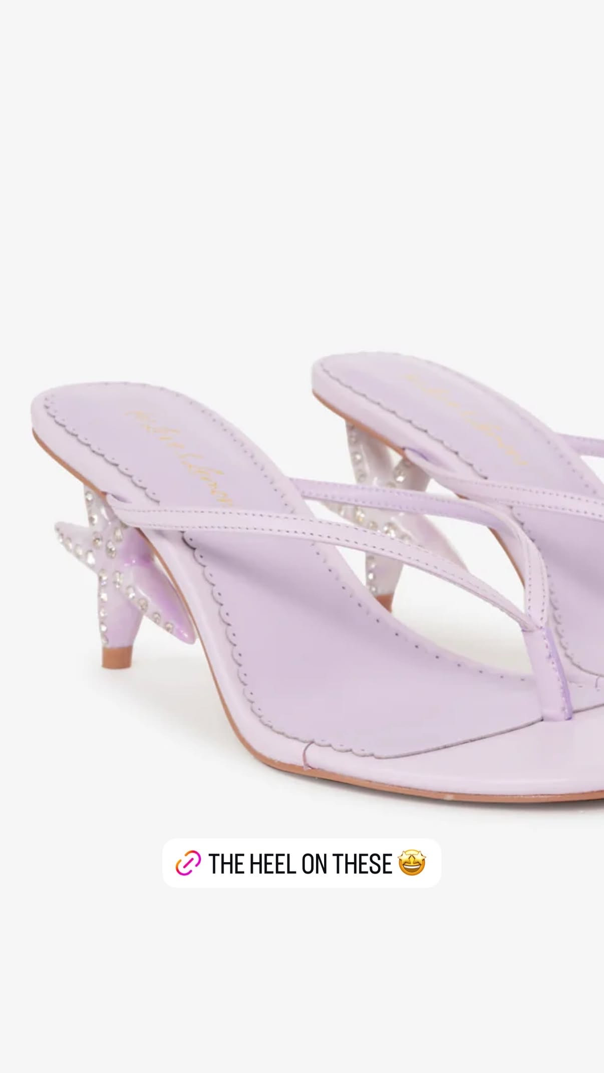 The heel on these. I need a moment.
Soleil's Starfish Thong Heel in lavender is a kitten heel thong sandal with a crystal-embellished starfish as the heel — scalloped edge footbed, lilac leather, the kind of shoe detail that makes people crouch down at a dinner party to get a closer look. It's playful without being costumey because the silhouette is clean and the heel height is wearable.
At $249 this is the summer shoe purchase you make when you want one thing in your rotation that's genuinely joyful to put on. Wear it with a white linen dress, a midi skirt, or linen wide-legs and a simple tank. The shoe does all the talking. 

 