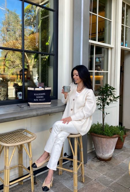 Spring outfit idea:
- Mongolian cashmere oversized sweater cardigan. The quality is SO good and iIf you are a new customer to Quince, you can use my code for 10% off.  INFG-DANIKA10 
- bone colored jeans. This gorgeous off-white color is called “vintage canvas”. I went down a size to get the perfect fit. 
- black and neutral tote bag. I’ve had this for 4 years and it still looks brand new. You can actually customize the text on the bag to make it say whatever you would like it to. Great for a gift or yourself.
- Chanel cap toe ballet flats. 

Spring jeans
Spring sweater 
Cocoon sweater 
Spring outfit 
Off-white jeans 

#LTKover40 #LTKSeasonal #LTKitbag