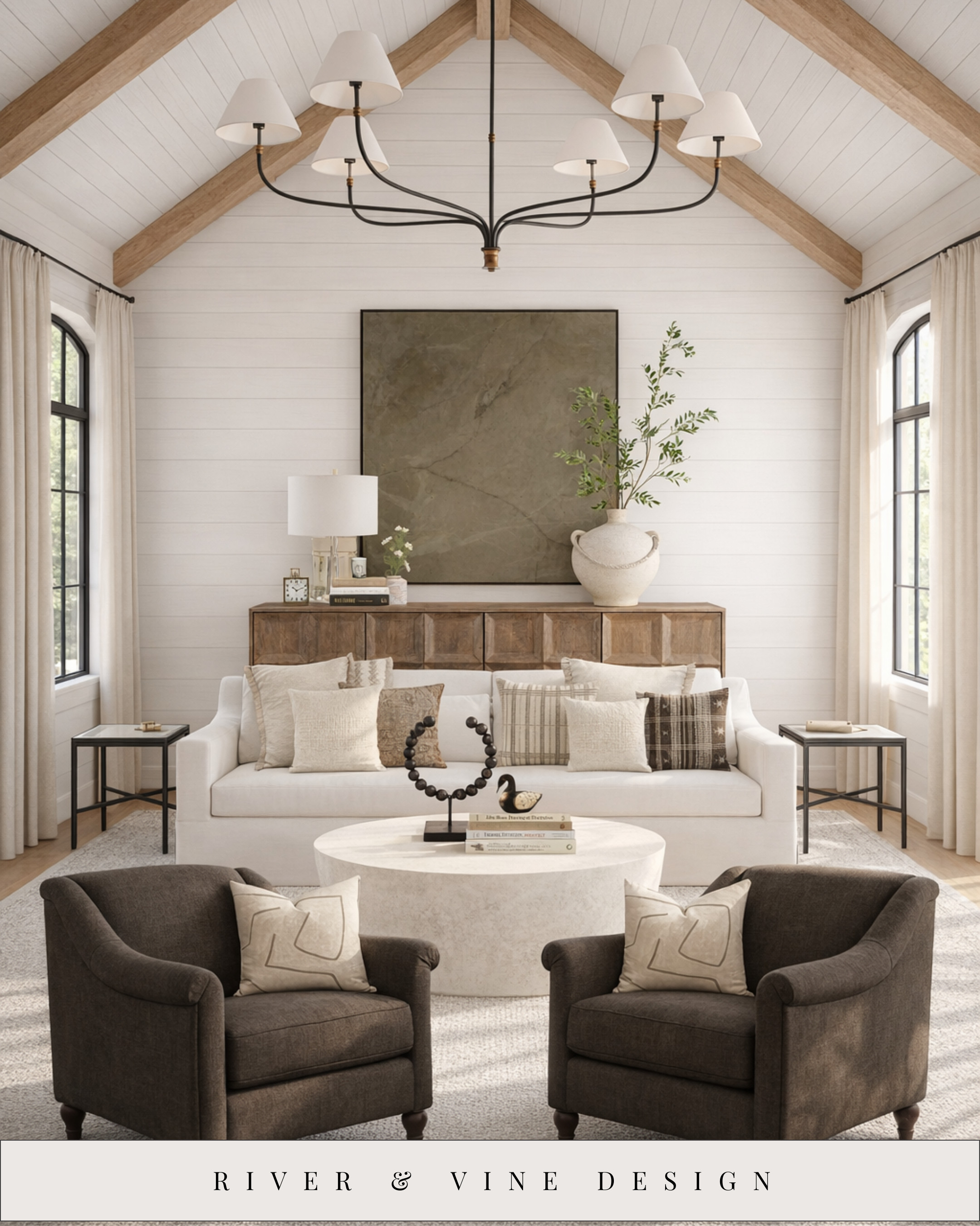 This is how you make a living room feel custom-built without making it feel heavy.
Vaulted ceilings + white shiplap instantly brighten a space, but it’s the light oak beams that give it warmth and architectural depth. That contrast is what keeps the room from feeling flat.

I layered classic shapes with soft textures to keep everything timeless but relaxed. A tailored white sofa anchors the room, while darker accent chairs add grounding and balance. The stone coffee table brings in subtle movement, and the neutral pillows add dimension without stealing attention.

This is a perfect example of “light and classic” done right—airy, elevated, and calm, but still rich with texture and detail. If you’re designing a vaulted space, this combination is foolproof for creating that high-end, magazine-quality feel! 

 #LTKHome