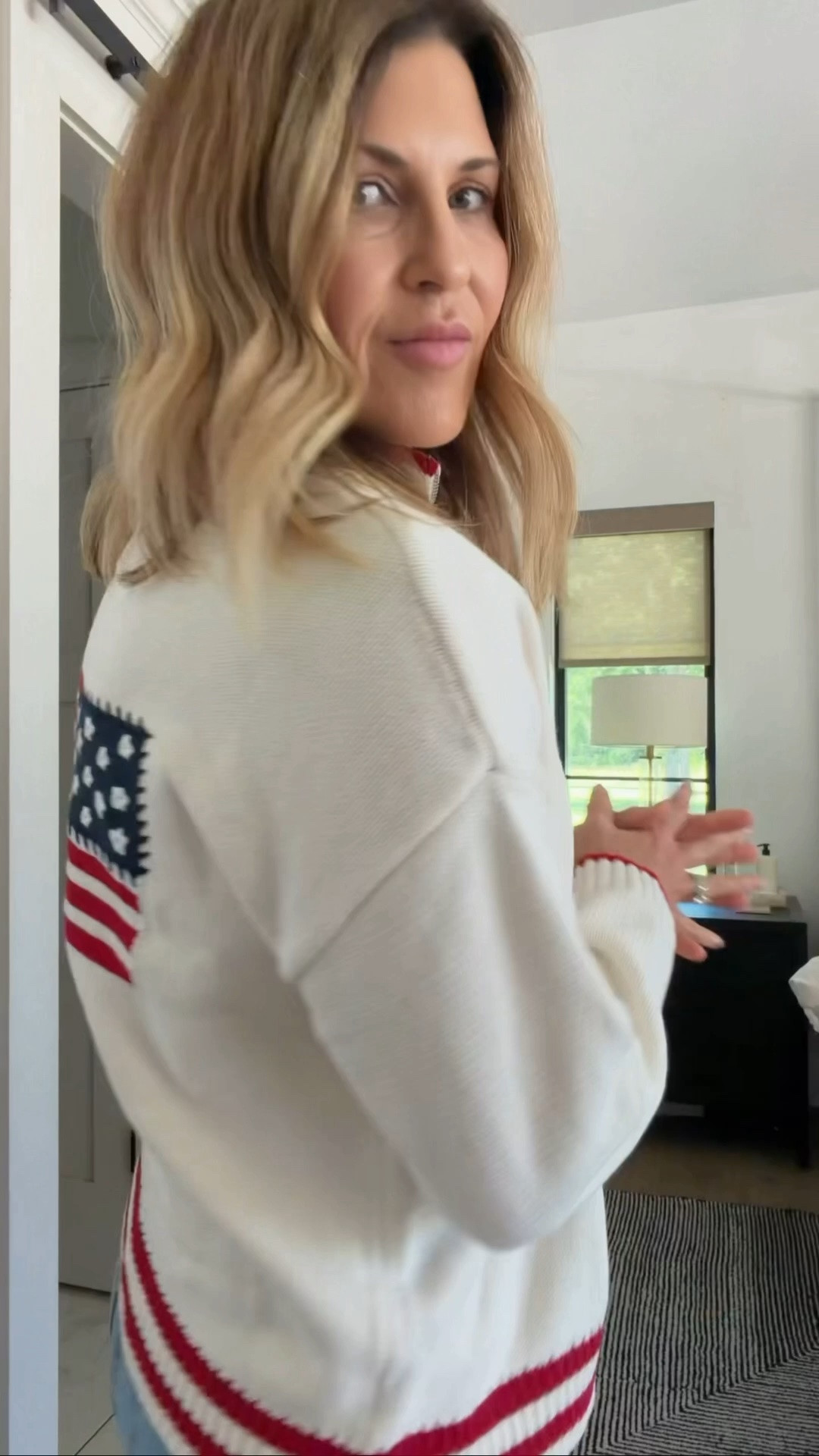 Wearing a size medium in flag sweater

#LTKOver40