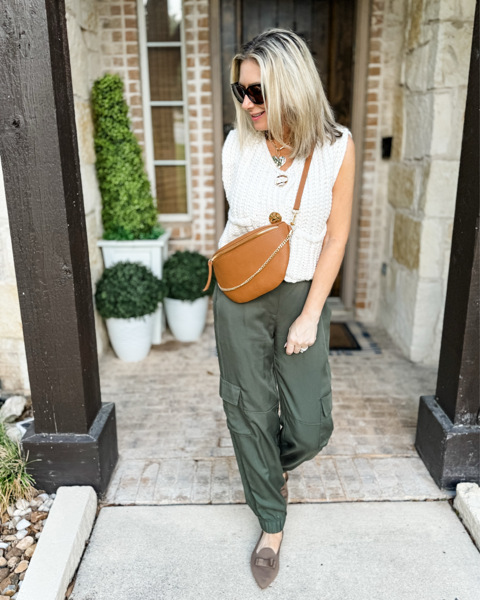 Can we take a moment for this sling bag? It’s such a great everyday bag that keeps your hands free, actually has room for all the things you need (and two pockets that can easily fit your phone) and the gold chain detail dresses your whole outfit up. My friend Jen from @hauteofftherack designed this for @giginewyork and she nailed it! There’s also a webbing strap sold separately that makes it ideal for travel or just for a more casual option. It comes in a few other colors (including a black faux croc) but that tan just grabbed me!! You can grab it  too for 20% off with code MARNIE20. The actual outfit is a bargain with both pieces under $50! 

#travelbag #crossbodybag #slingbag #casualoutfit #joggers #tenceljogger #falloutfit #fashionover50 

#LTKItBag #LTKOver40 #LTKFindsUnder50
