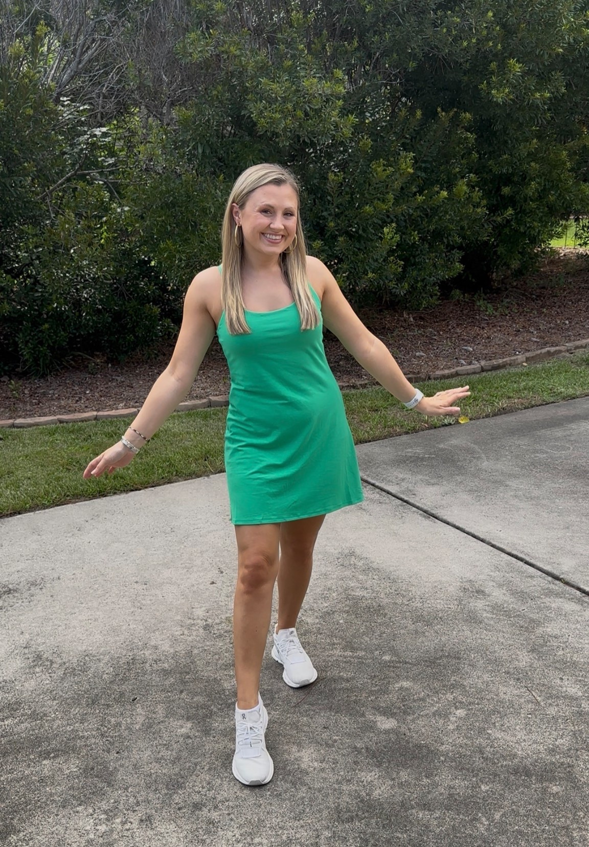 Love an athletic dress! 

Athletic Dress: 90 Degree by Reflex (Bought at Nordstrom Rack, 90 Degrees by Reflex still has it on their website), Lux Dress in color simply green, Size M
Shoes: ON Cloudnova
Earrings: Sheila Fajl