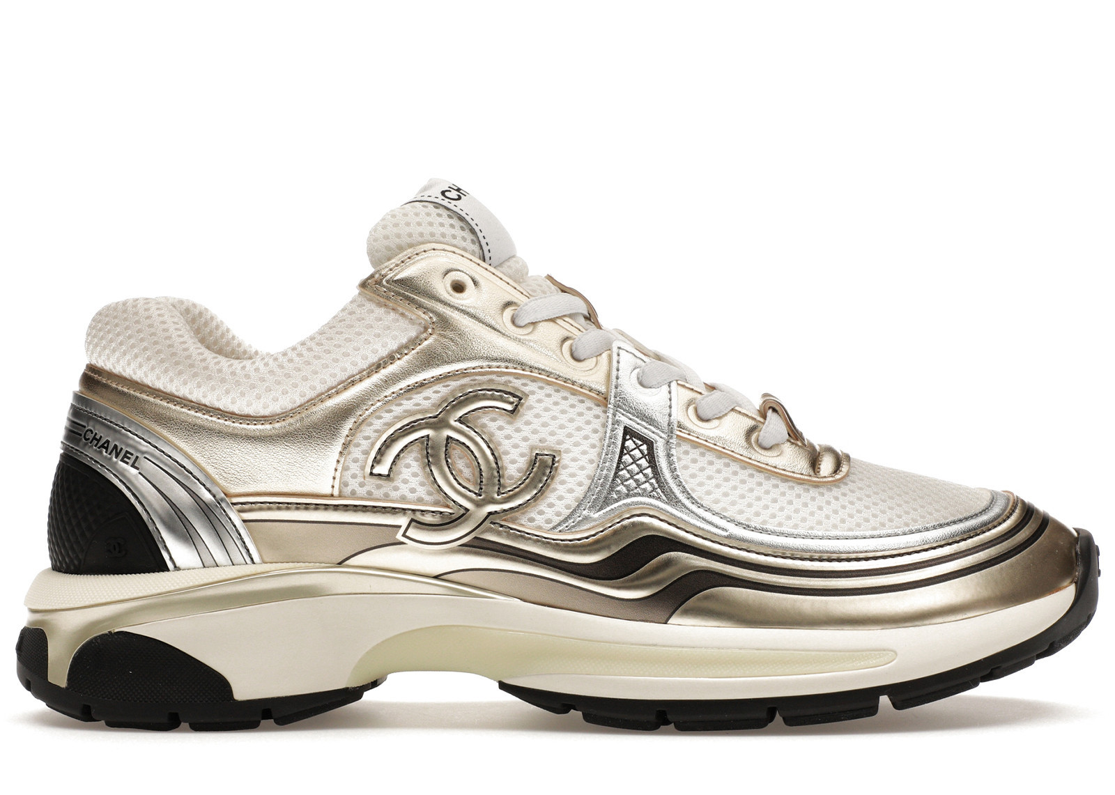 Women's Chanel CC Runner Laminate Sneakers in Gold/White/Black | StockX