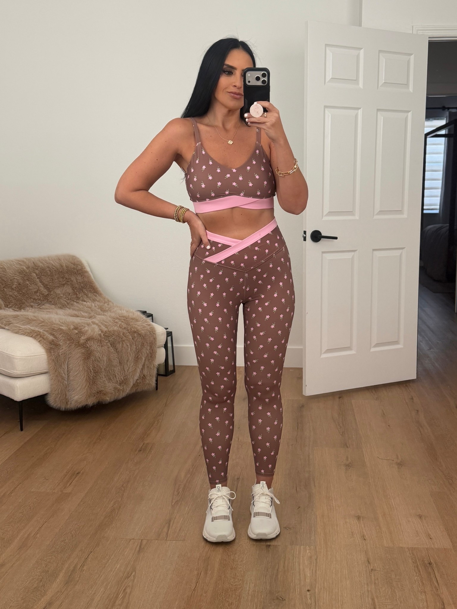 Women's Low Support Crossover Sports Bra wearing size medium. Women's High-Rise Crossover Waistband 7/8 Leggings wearing size medium. 