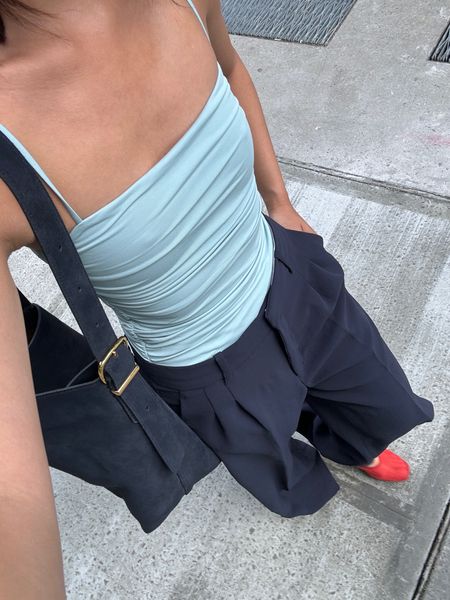 Bodysuit size small (so comfy I got white too), pants size 4 for loose fit (they’re super long and I’m 5’7) linked exact bag but the blue is no longer available :-(