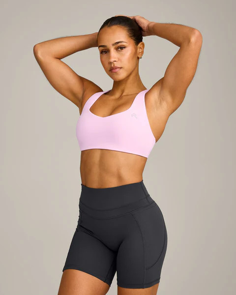 EasyLift™ Cross Back Sports Bra with Gray Logo 
 Chalk Pink | Oner Active (UK / US)