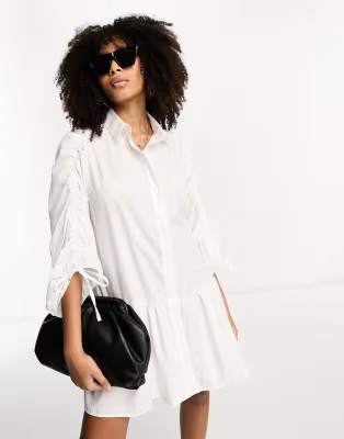 ASOS DESIGN cotton mini smock shirt dress with pep hem in white | ASOS (Global)