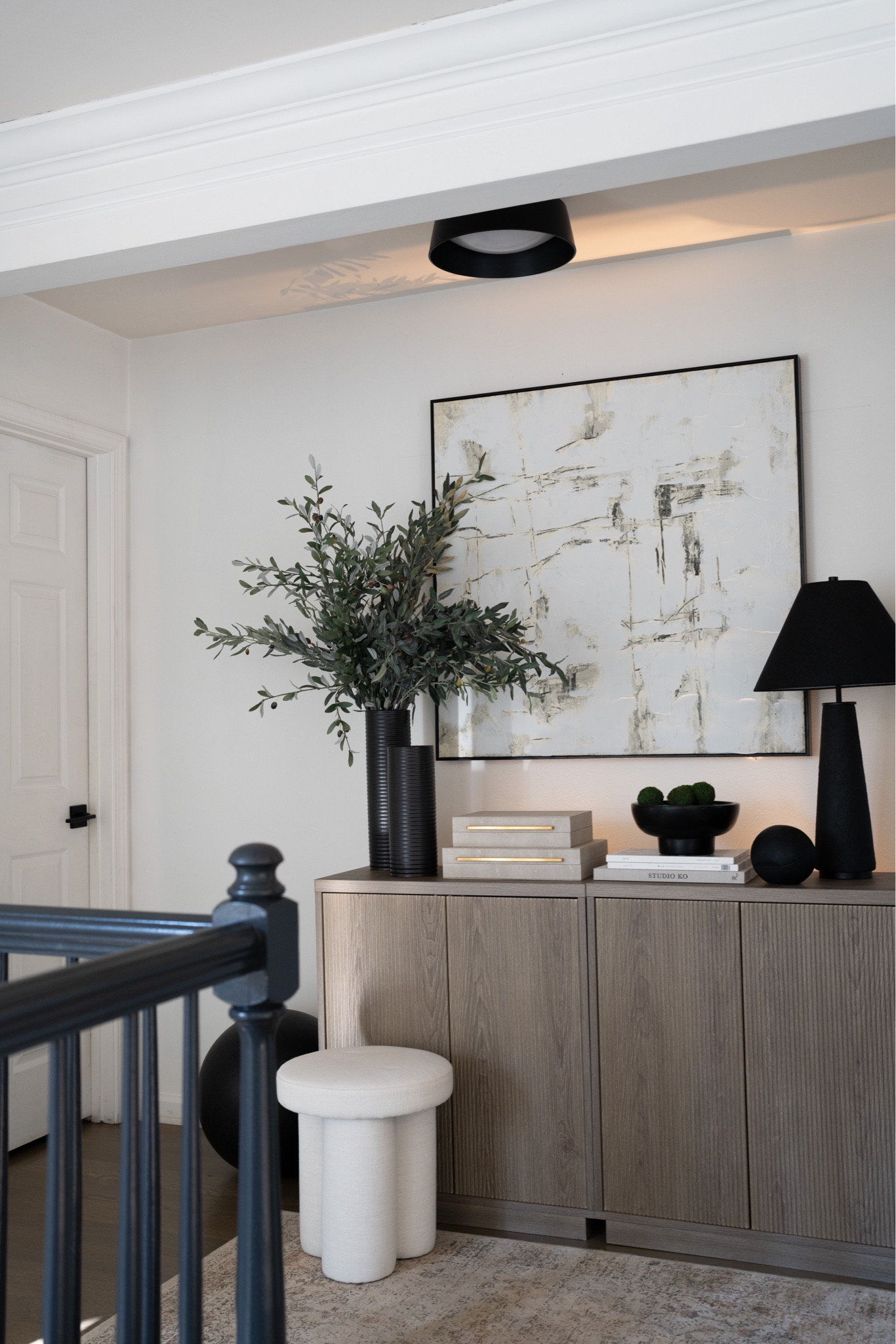 Awkward spaces can be a challenge but with a few hacks like these slim cabinets, oversized art, and greenery and a rug a space can really be brought to life! 

#LTKMostLoved #LTKStyleTip #LTKHome