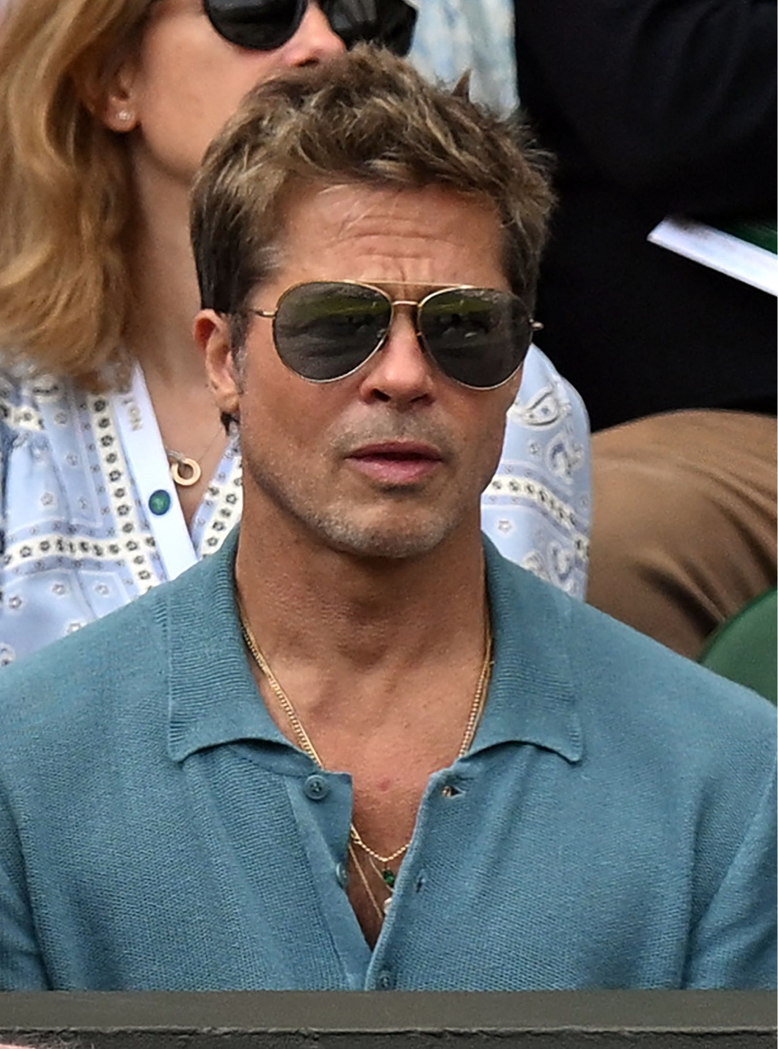 Shop Brad Pitt's blue short sleeve knit polo shirts and silver aviator sunglasses

#LTKmens #LTKstyletip #LTKFind