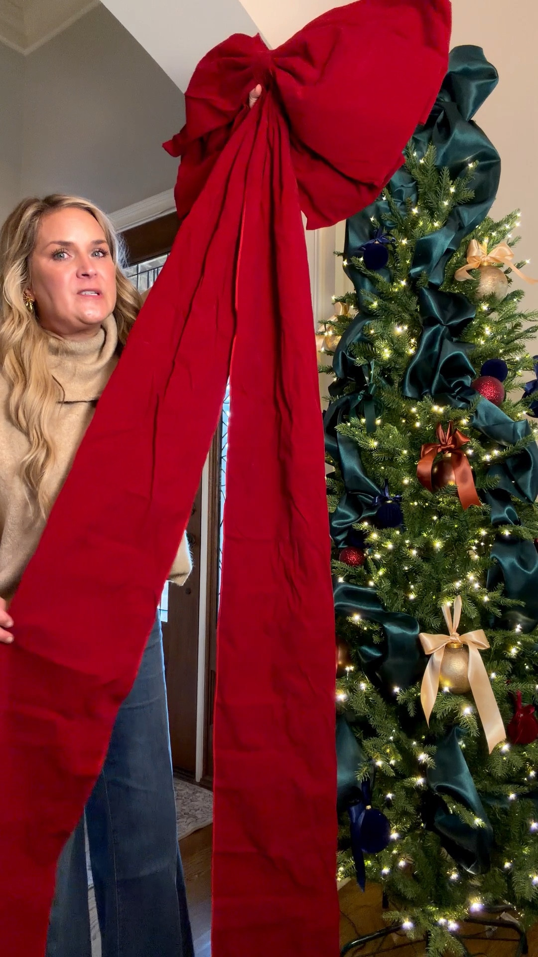 A gorgeous velvet bow tree topper in the perfect shade of red! 

She’s large and would be beautiful on a tree or positioned to the side of your front door for Christmas! 

#LTKSeasonal #LTKHome #LTKHoliday