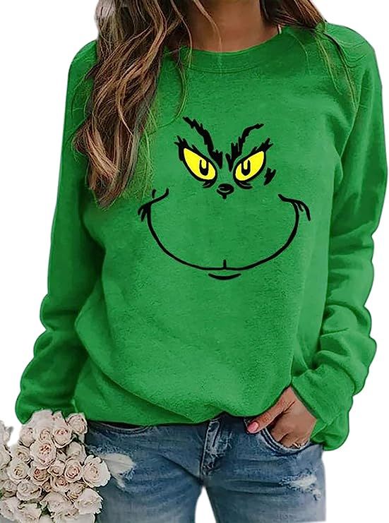 SAFRISIOR Women’s Cute Grinch Christmas Sweatshirts Raglan Long Sleeve Crew Neck Graphic Printe... | Amazon (US)