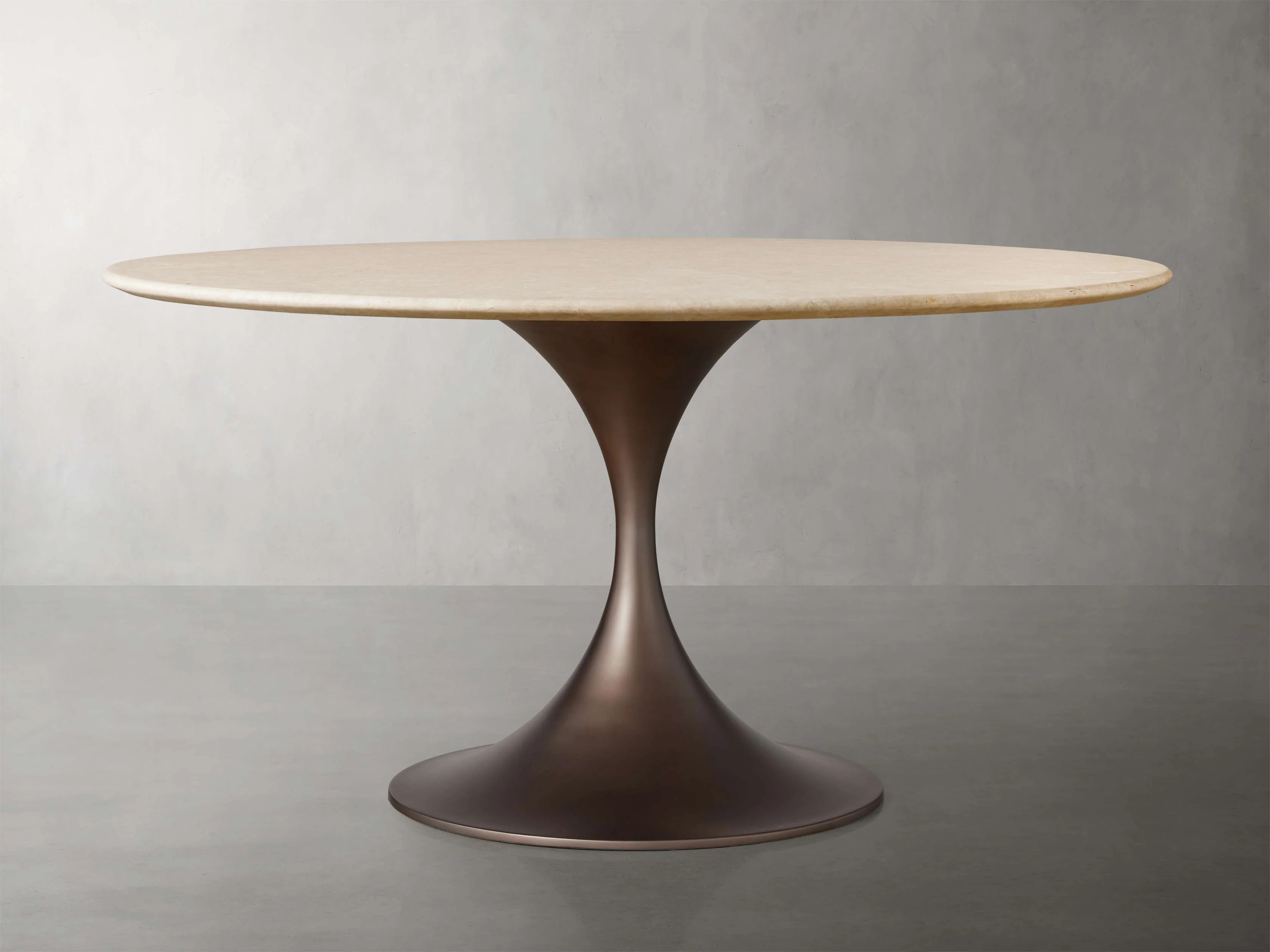 Saint Germain Round Stone Dining Table with Launette Base | Arhaus