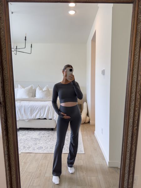 Love a good two piece set and this one is buttery soft!! 🫶🏽 wearing a medium on top and 6 on bottoms in coal grey. I sized up a size for the bump! 🤍 @aritzia #aritziapartner 

#LTKfindsunder100 #LTKbump #LTKfitness