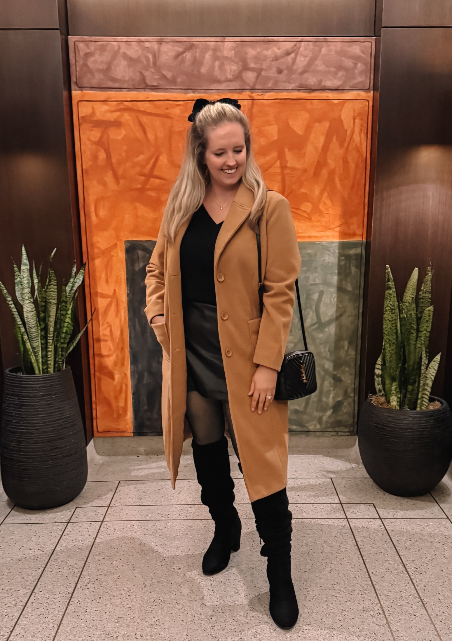 Holiday party outfit complete with a neutral winter coat to match every outfit all winter long. Love an all black moment and this faux leather skirt is actually a skort! Never be concerned about it riding up again.

#LTKMidsize #LTKHoliday #LTKSeasonal