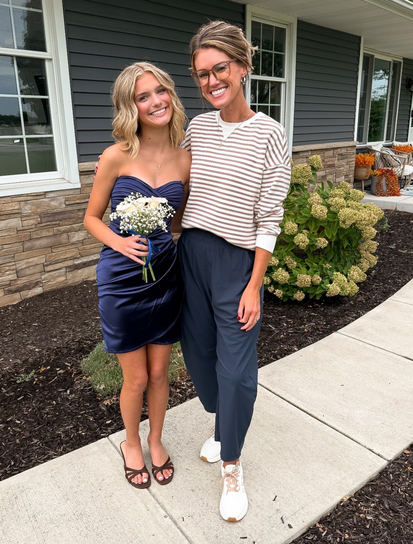 I’m a little under dressed compared to my beautiful niece. 
Wearing small in sweatshirt and pants. Shoes size down if between

#LTKSeasonal #LTKOver40 #LTKActive