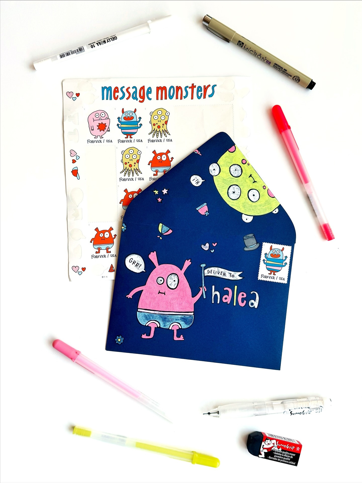 Day 21: Monster 👀🎩✉️

My mind immediately went to the stamp I was going to use for this prompt, so I decided to just use the Message Monster stamps as inspo for the whole envelope. They were released in 2021, and I wish I had more of them left. They are one of Agnes’ fave stamps, but I’ve had to slow her use so that we have some left for special occasions, such as a monster envelope theme.

I’m also slow today because to get the light pink color I needed here and there, I used the Soufflé pens by @sakuraofamerica. They are super juicy and fun, but take a minute to dry. But, we made it, and we’ve got some cute little monsters to present to the class. ☺️

This envelope will be off to @yourstrulea, the first person who filled out my form last week!

🖊️: @sakuraofamerica Pigma Micron 10, Gelly Roll pens and Soufflé pens
✉️: @papersource envelope in Night
.
.
.
#bewitchingenvelopes #bewitchingenvelopes2025
#papersource #bewitchingenvelopes #countdowntohalloween #halloweencountdown #halloween #halloweenlove @papersource #papersource #papersourcecreativecollective #sakuraofamerica #soufflepen #gelpen #gelpenart #messagemonstersstamps #uspostalservice #postagestamps #postagestamp #usps #monster #cutemonster