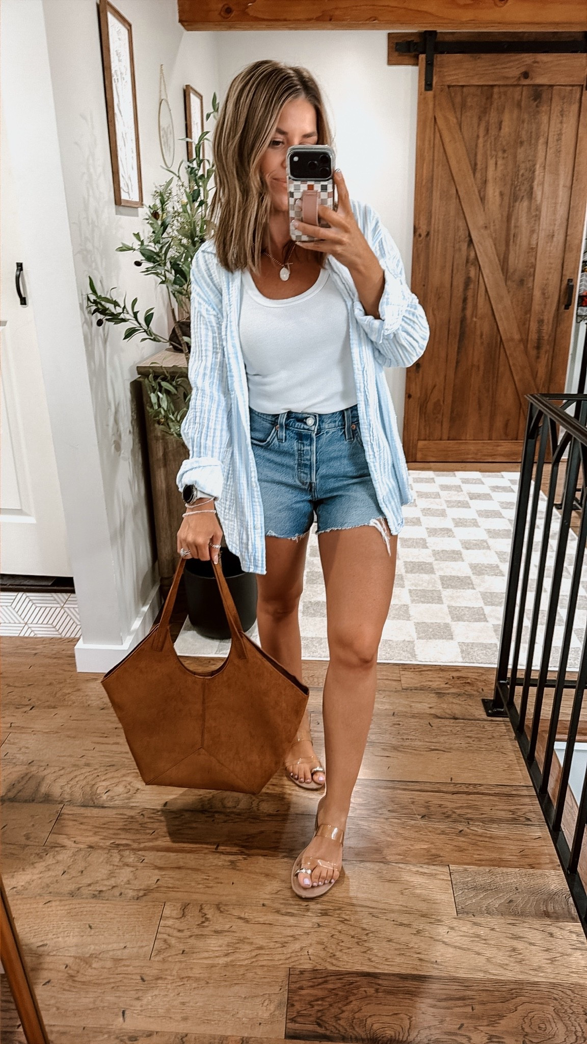 The curve love Levi’s are where it’s at ladies! I know I’m late to the game, but I’m so glad I finally bought! If you have hips & a booty grab them! 
I’m wearing a side 26! 
Button down: XS ( it’s oversized) 
Tank: xsmall 

This bag is also the bag of the fall!

#LTKfitnessgoals #LTKootd #LTKdayinmylife