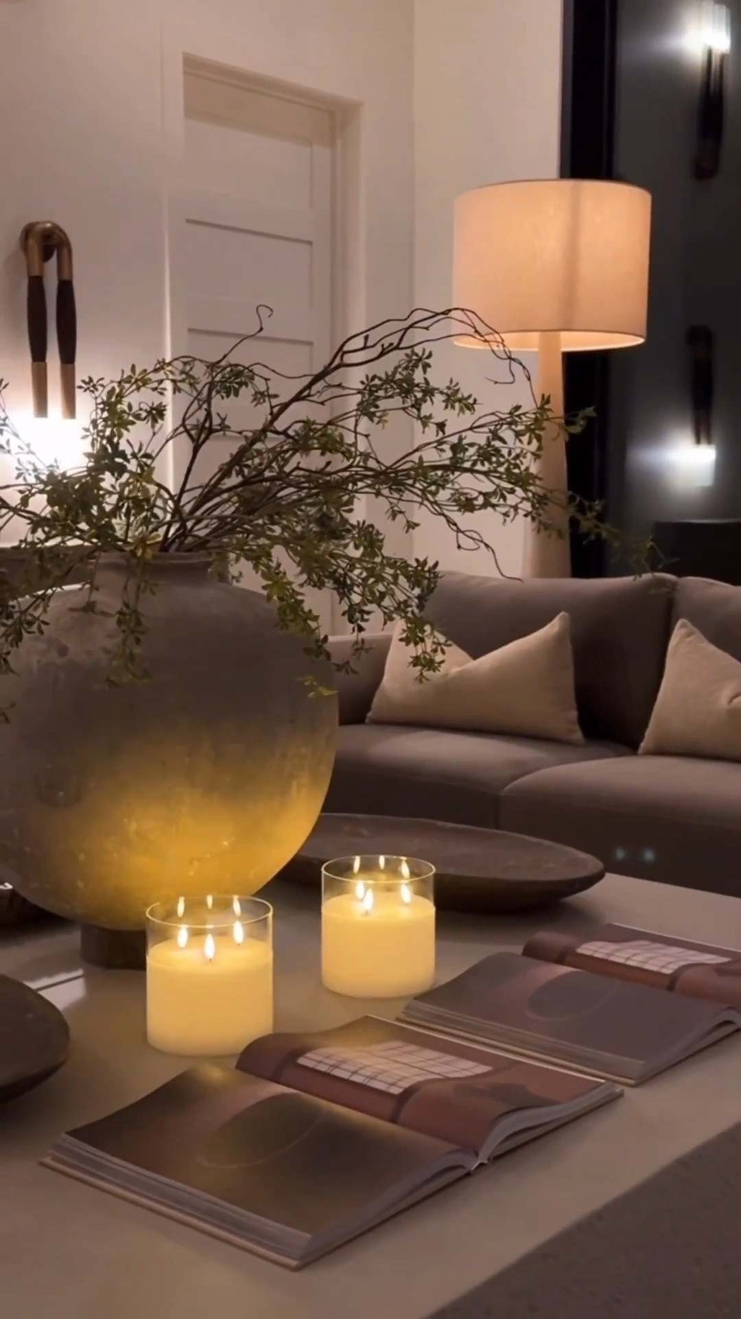 Creating a warm, modern living room vibe with this concrete coffee table styled to perfection. The oversized ceramic vase, realistic faux greenery, flameless candles, and decorative books add so much texture and dimension. Paired with a velvet couch, it’s the perfect mix of cozy, elevated, and budget‑friendly home decor. This setup is one of my favorite ways to bring that designer look into any space. 🤍✨


#amazonhome #livingroomdecor #coffeetablestyling #modernhomedecor #neutralhomedecor #cozyhomevibes #interiorinspo #homestylingideas #budgetfriendlydecor


#LTKHome #LTKdayinmylife #LTKvlog