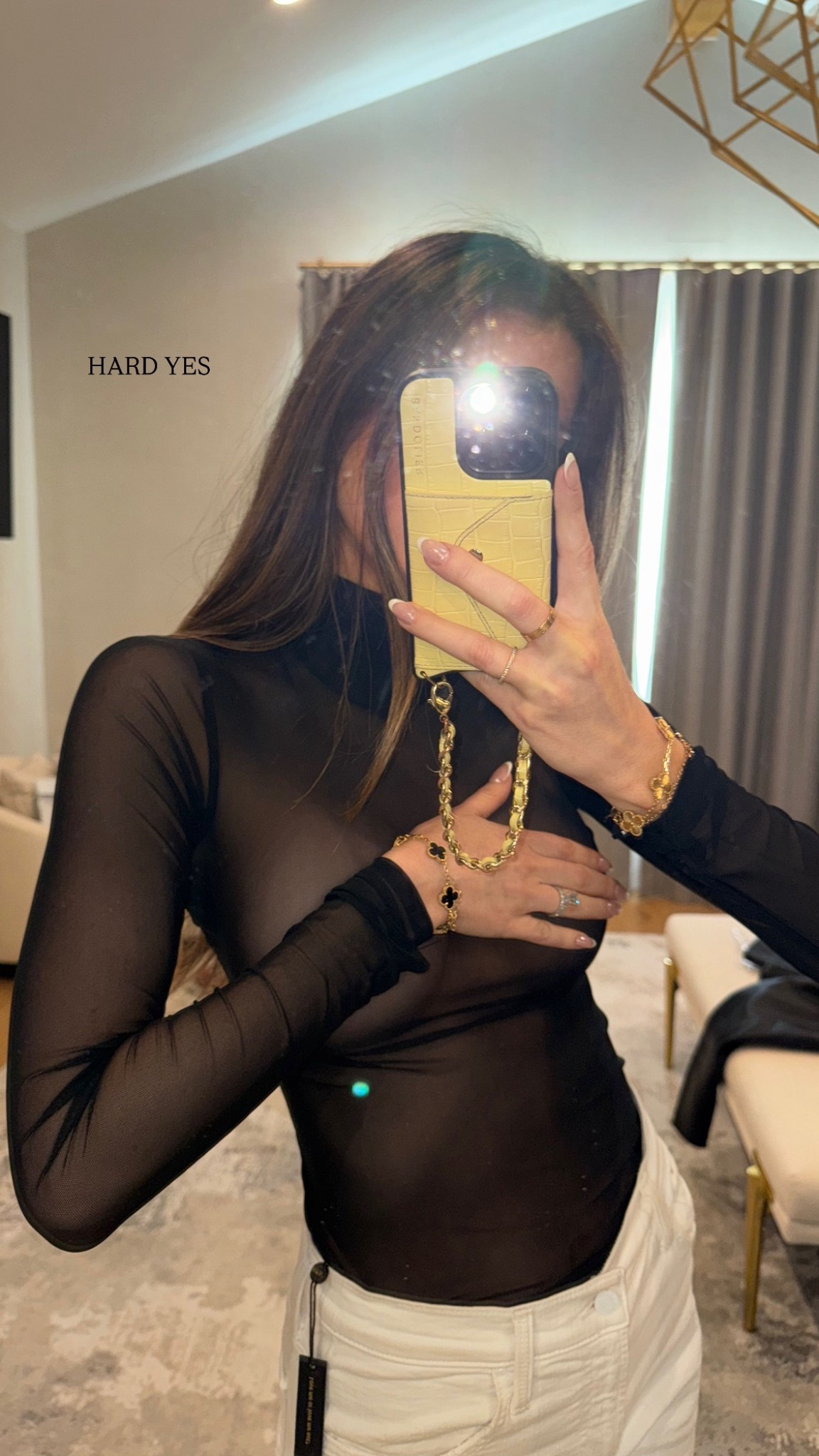 Sheer black top for date night. 