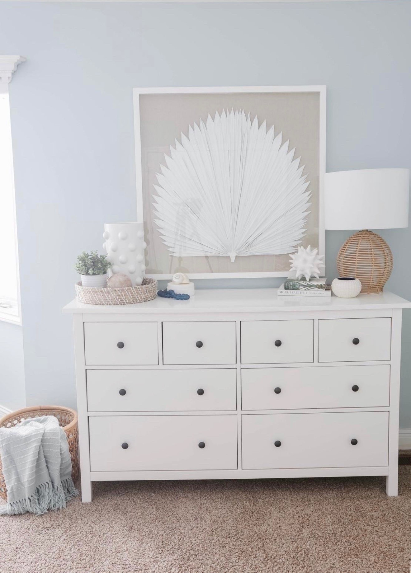 This blue bedroom with a white dresser, palm leaf artwork, and layered coastal decor is one of my favorite modern coastal spaces. I love how the blue walls paired with crisp white furniture and beachy accents make the room feel calm, bright, and designer-inspired.

#LTKHome #LTKSaleAlert #LTKU