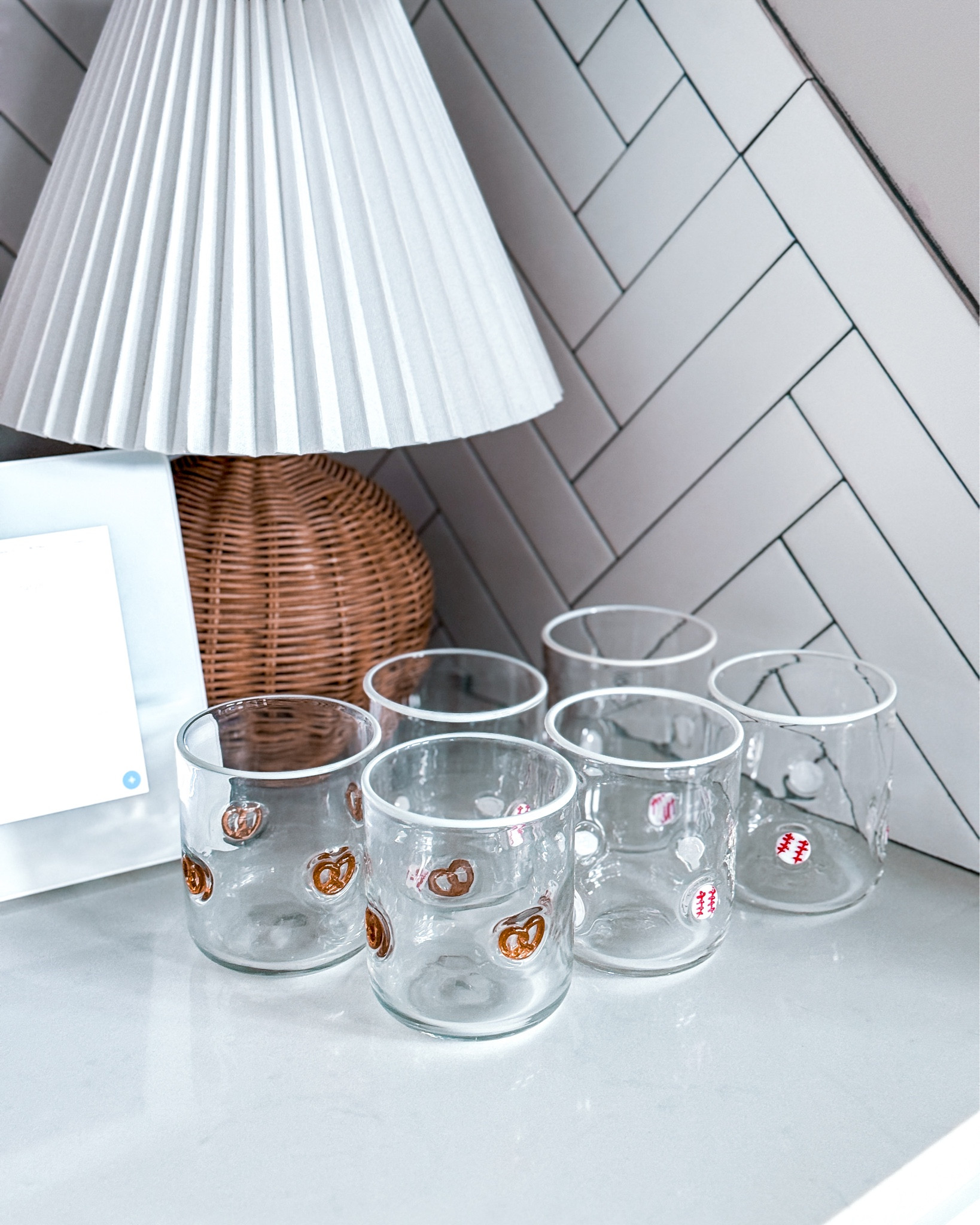 The perfect game day icon glasses. Honestly, these might be my favorite Anthropologie icon glasses. Linked on LTK, & they would make the most thoughtful gift for the sports lover, the snack girlie, or honestly anyone who wants their kitchen to have a little more character.

novelty drinkware - clear glass tumblers - white rim glasses - pretzel glasses - baseball glasses - fun drinkware gifts - unique kitchen gifts - gifts for sports fans - aesthetic kitchen finds - hostess gift ideas - LTK home finds - cute drinking glasses - small batch glassware - artisan drinkware - gift ideas for her - home entertaining essentials - LTK gift guide - conversational glassware - everyday drinkware​​​​​​​​​​​​​​​​

#LTKfoodie #LTKHome #LTKdayinmylife