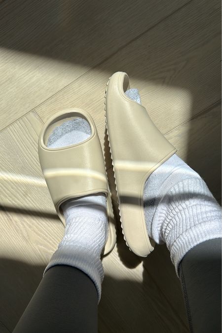 $15 slides that go with everything! Pool, beach, active wear, lounge wear, etc. so comfy and clean easily! Come in several color options too! These are the off white but the sun is giving them a warmer tint.

#LTKshoecrush #LTKfindsunder50