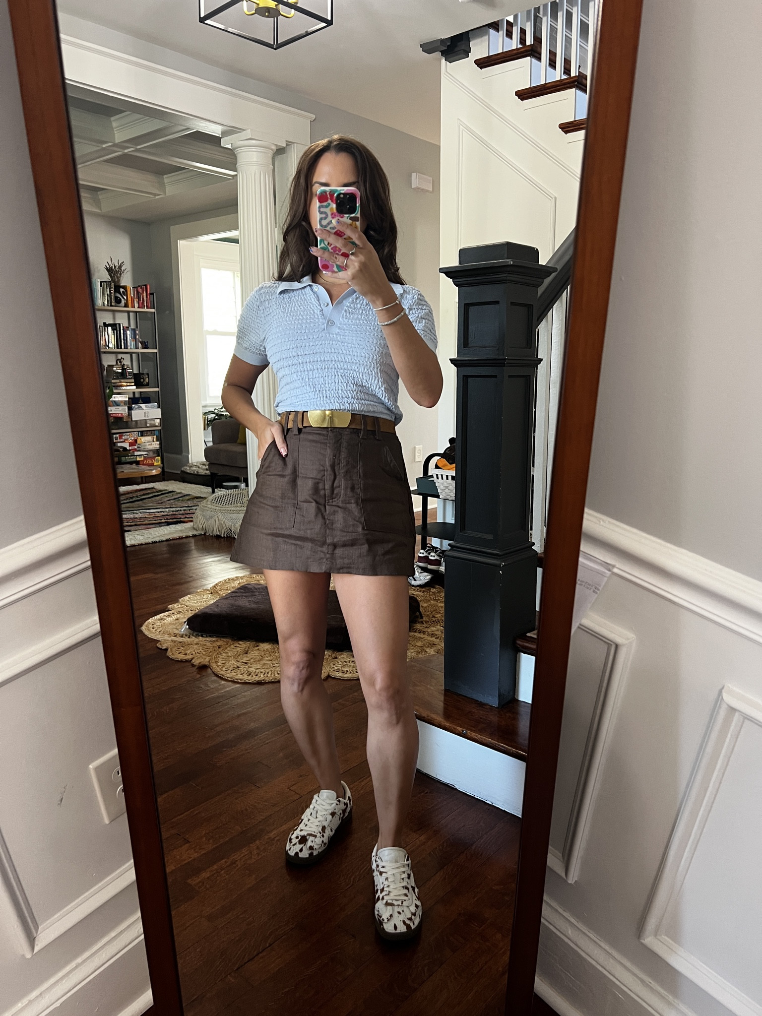 baby blue and brown the the best color combo right now. 

dissh skort. brown linen. brown linen skort. baby blue polo. frame. cow print sneakers. calf hair sneakers.  

 #LTKootd #LTKSaleAlert
