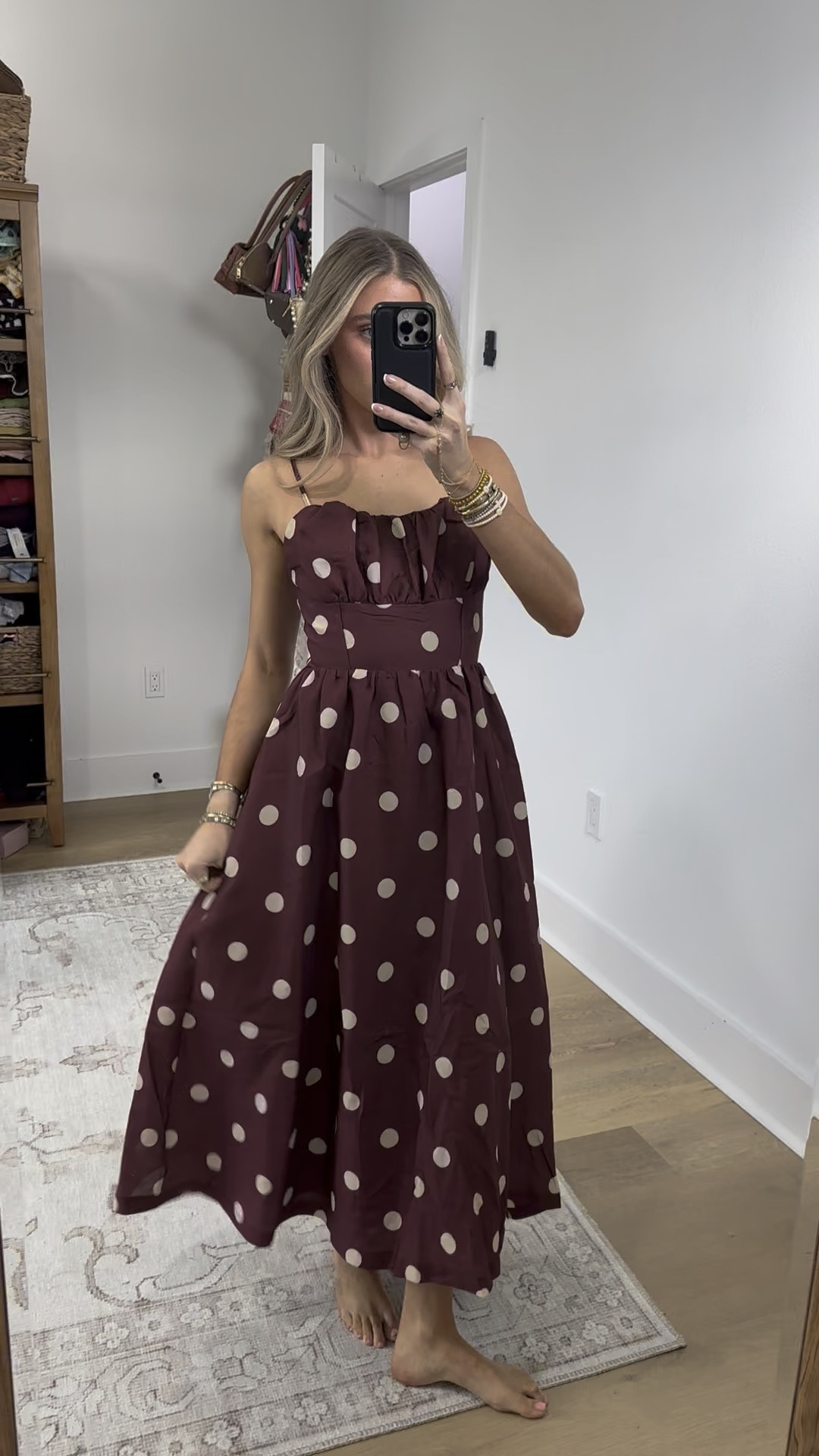 @ladyblacktie size small dress. This sophisticated burgundy midi dress features a chic polka dot print and a woven fabric. It highlights a straight neckline with slender straps, a fitted shirred bodice, a wide waistband, and a gracefully flowing skirt, secured with a back zipper closure.

#LTKootd #LTKWedding #LTKFindsUnder100