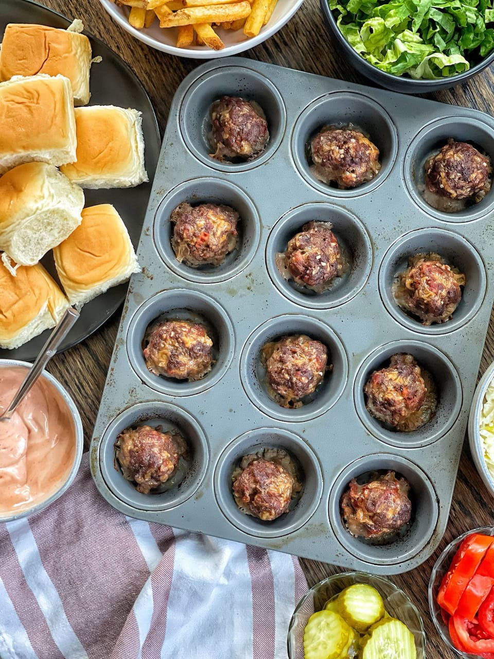 Light Bacon Cheeseburger Inspired Meatballs made in a muffin tin for easy making and easy clean-up. Great for kid-friendly dinner or meal-prep. Full recipe on www.sweetsavoryandsteph.com 

 #LTKHome #LTKFamily