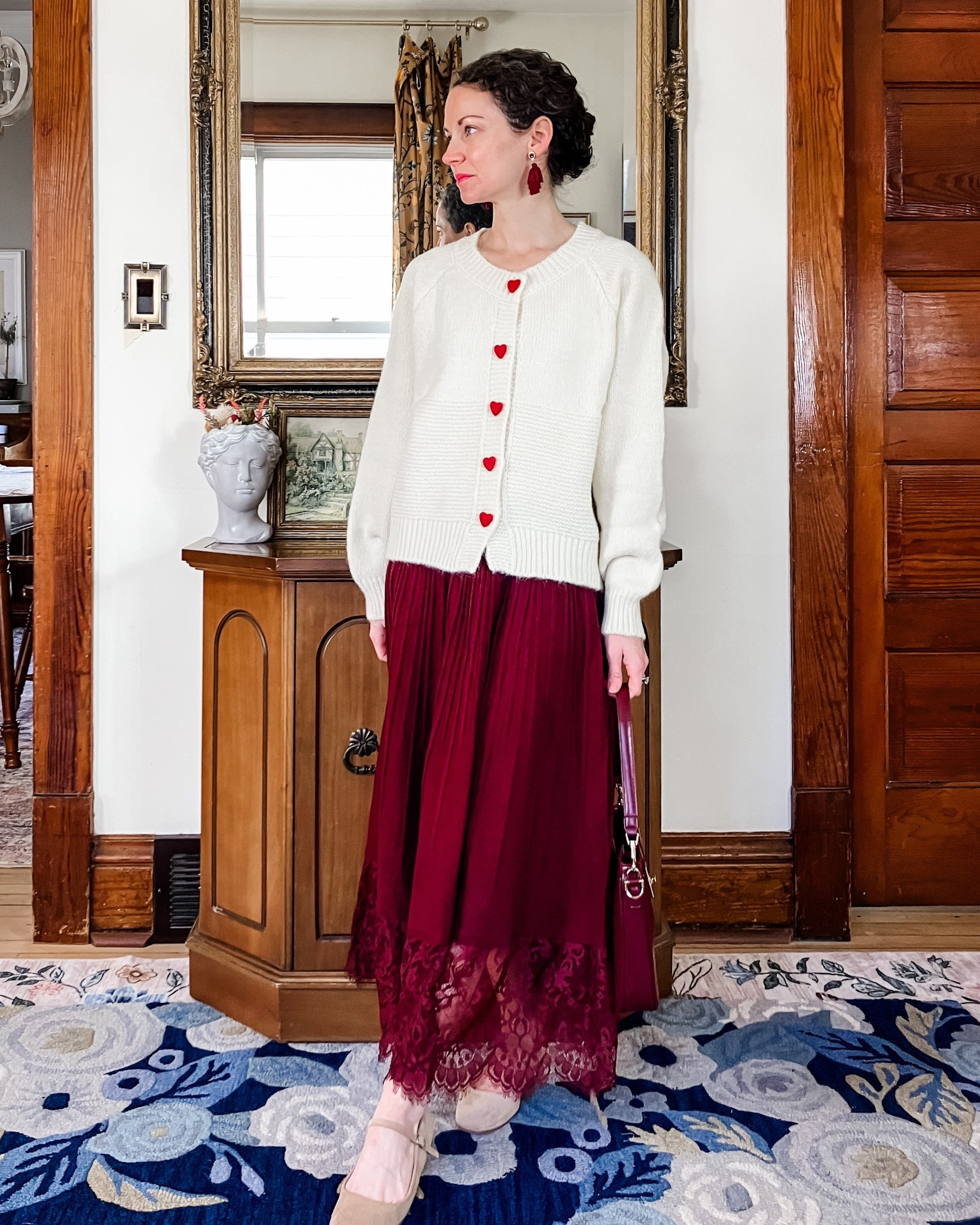 A modest Valentine’s Day outfit!
A cream cardigan with heart buttons from Chicwish. 
A burgundy sweater skirt with lace hem from Chicwish. 
A burgundy bag from Urban Expressions. 
Linking similar nude ballet flats. 
Petite outfit. Modest outfit. Valentines Day outfit. Burgundy outfit  

#LTKmomlife #LTKSeasonal #LTKgrwm