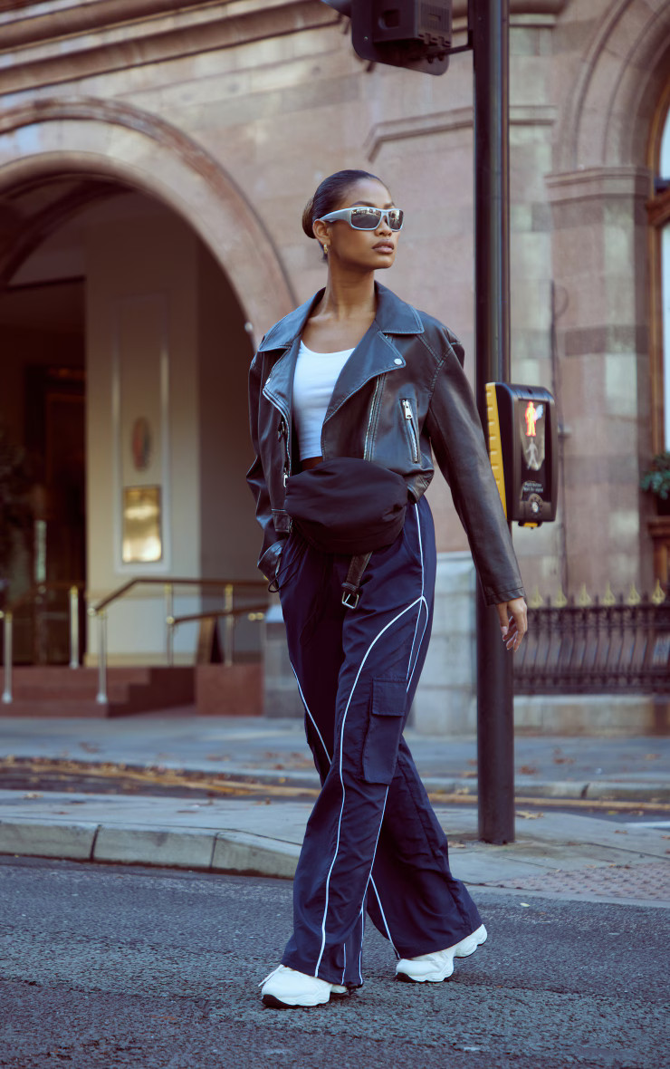 Black Distressed Look Oversized Belted Hem Biker Jacket | PrettyLittleThing UK