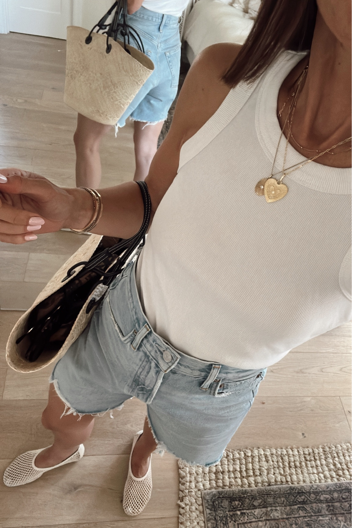One of my favorite basic white tanks 
Runs tts 
And cut offs are so comfortable and the perfect length 


#LTKOver40