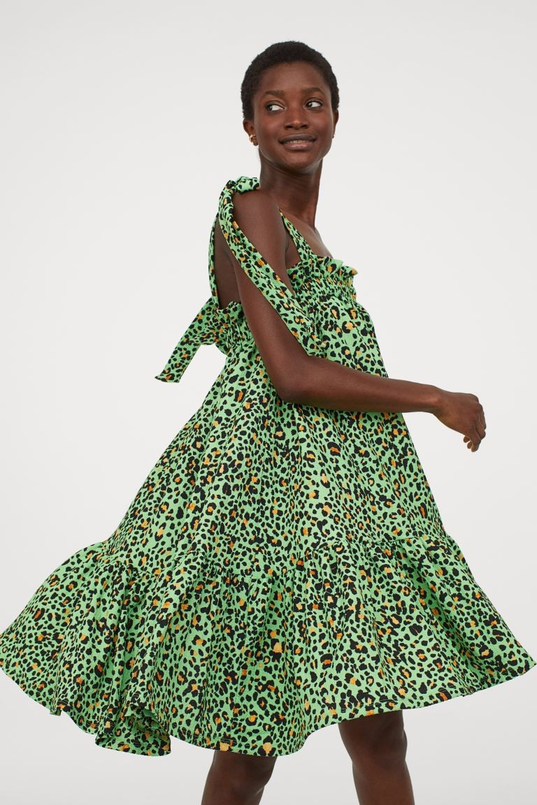 Voluminous, knee-length dress in jersey with concealed elastication and a frill trim around the t... | H&M (UK, MY, IN, SG, PH, TW, HK)