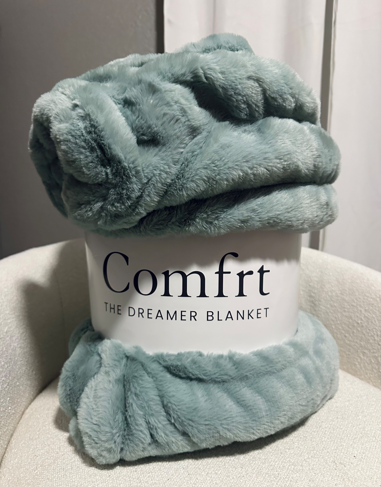Warm, cozy, slightly weighted, and with just the right amount of stretch. COMFRT DREAMER BLANKET 
#COMFRT #blanket 

#LTKHome #LTKGiftGuide #LTKFindsUnder100