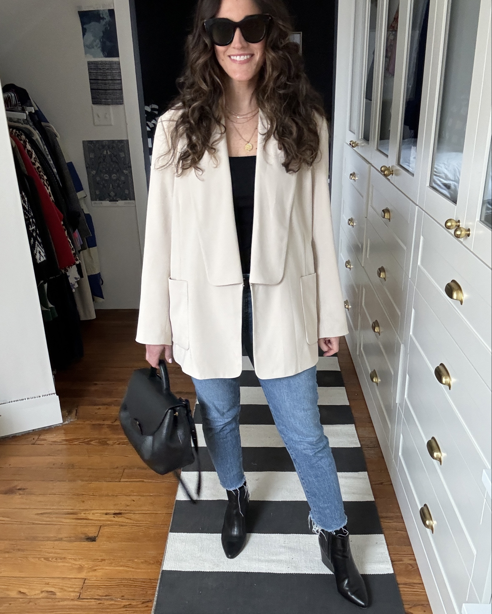 Nothin’ but neutrals 🖤🤍 

Blazer fits large so I’d recommend sizing down. Madewell’s Vintage Perfect Fit denim always fits a little large, imo  

#LTKover40 #LTKworkwear #LTKSeasonal