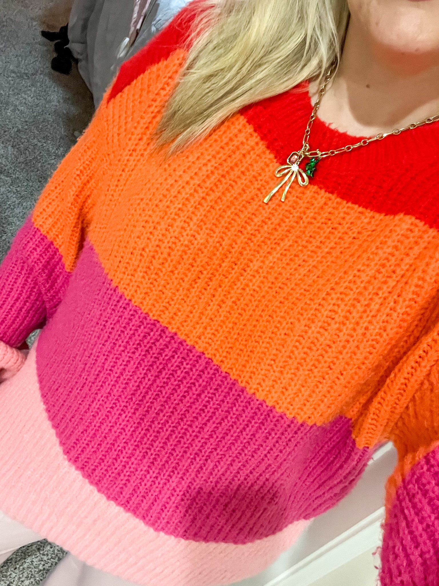 Holiday color block sweater
Pink and red sweater 
Bow holiday necklace


#LTKFindsUnder50 #LTKHoliday #LTKSeasonal