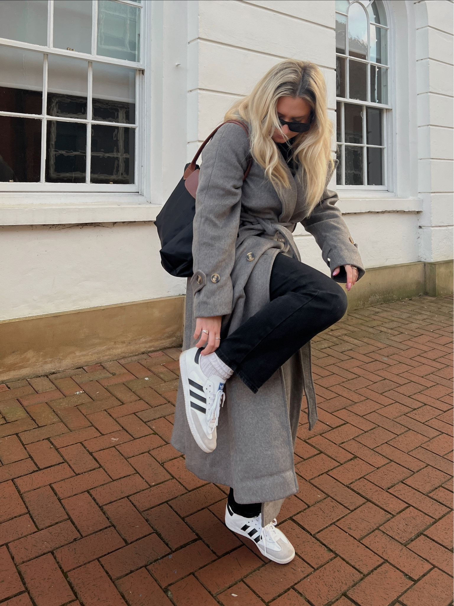 long belted wool blend grey trench coat, prada sunglasses, longchamp le pliage tote bag, black straight leg mom jeans and adidas samba trainers 

#LTKeurope #LTKSale #LTKstyletip