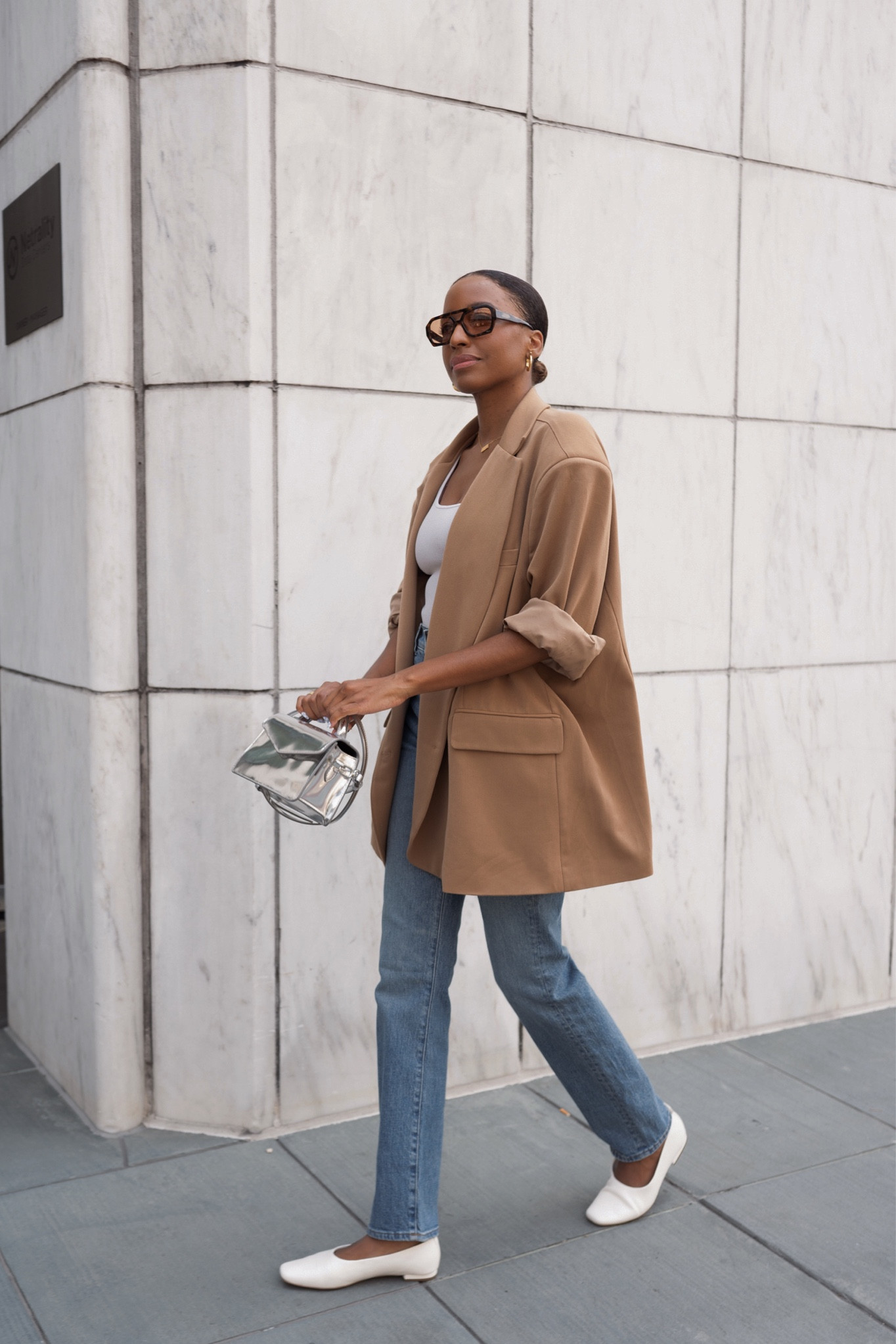 Simple and elevated is the vibe. An oversized blazer with straight jeans, a ribbed tank, ballet flats and a metallic top handle bag. Hitting every mark for the quiet luxury aesthetic. #madewell #aesthetic #quietluxury

#LTKover40 #LTKfindsunder100 #LTKSale