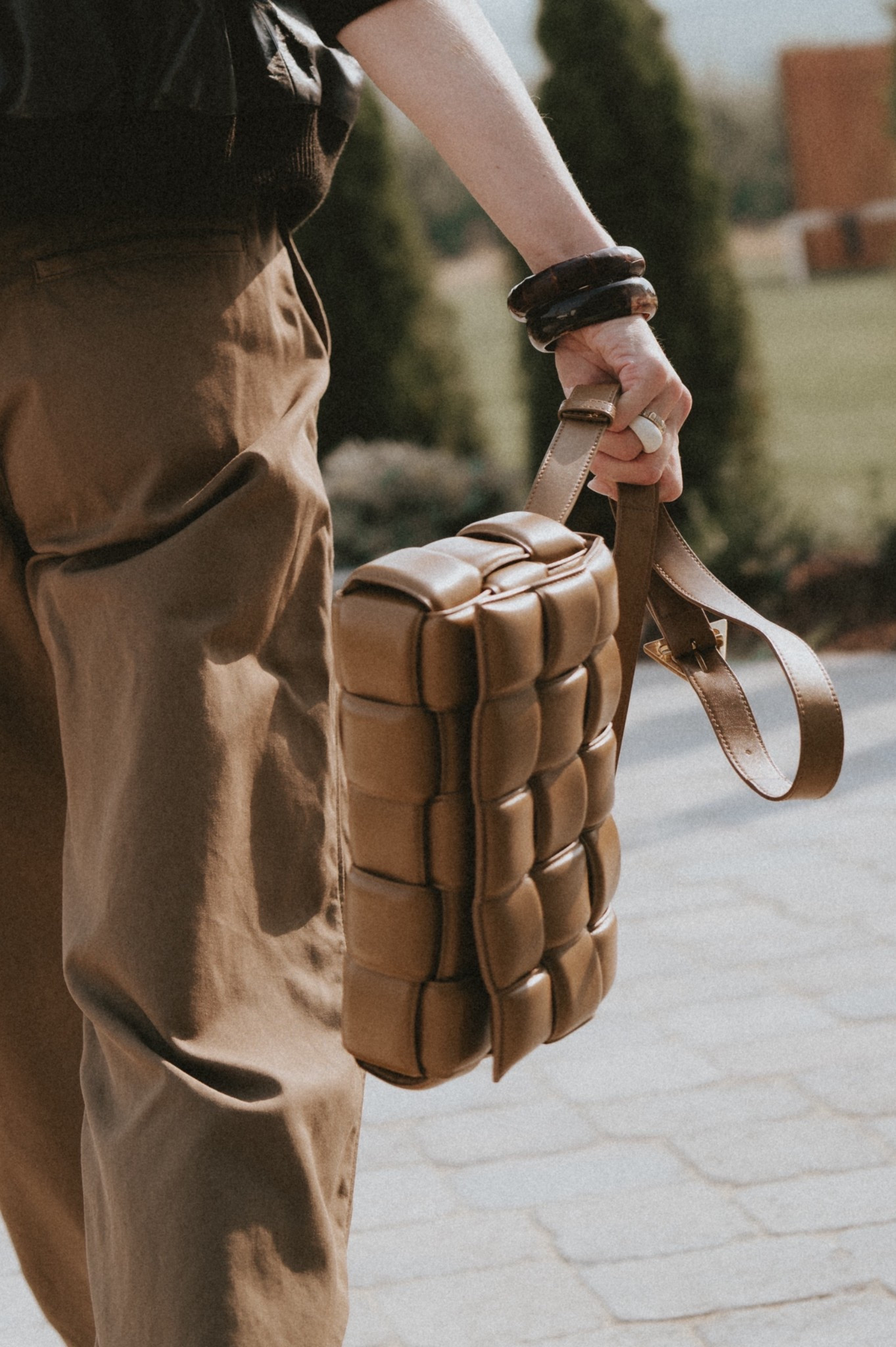 Never too early or late to start thinking about the 🎁 gifts. For the girl who loves statement accessories: can’t have too many bangles & bracelets. 
Accessorizing my casual outfit: wide leg pants + leather bomber jacket with bangle bracelets, a statement bag & kitten heels. 👠 

#LTKStyleTip #LTKWorkwear #LTKGiftGuide