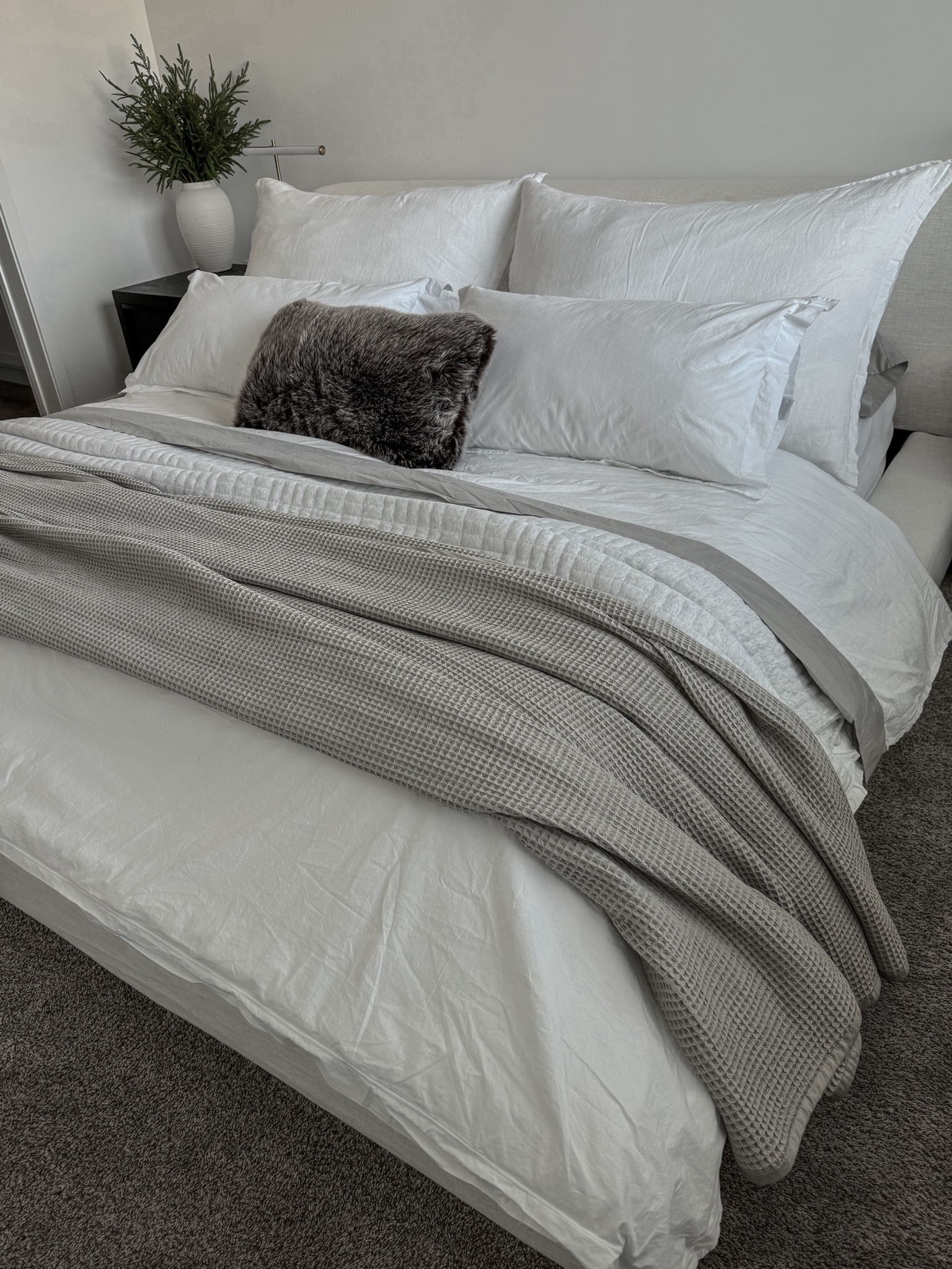 If you’re looking for that Pottery Barn cozy bed look, it’s all about the layers! Adding layers and mixing textures will give you that lux cozy feeling when you jump in your bed. 

My duvet cover and shams are from RH but I’ve linked similar styles below. The faux fur throw pillow is from Arhaus but they no longer sell it in brown. I’ve linked the colors they have available.


#homedecor #cozyhome #cozyvibes #cozy #winter #homestyling #holidayhome #christmasinspo #christmasdecorating

#LTKHoliday #LTKhome #LTKSeasonal