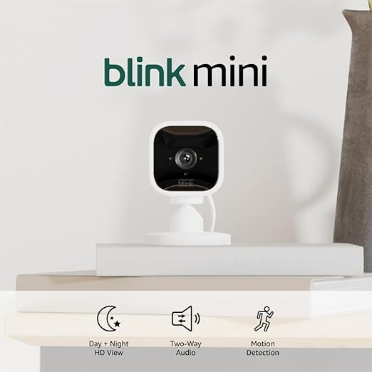 Blink Mini - Compact indoor plug-in smart security camera, 1080p HD video, night vision, motion d... | Amazon (US)