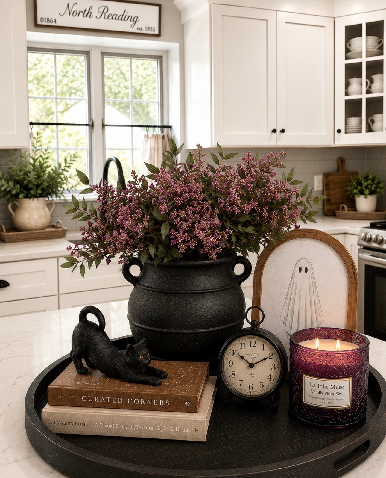 This cast-iron black cauldron bowl as a vase is perfection! 💜🖤

#LTKHome #LTKSeasonal