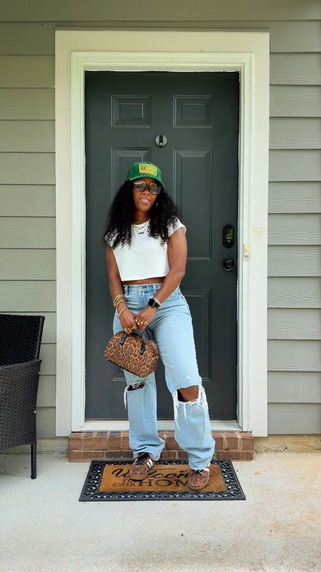 Summer outfit idea. I’m wearing a white crop top with Abercrombie & Fitch high waisted distressed jeans. I styled this casual outfit with a green trucker hat, leopard print purse, and leopard print sneakers

#LTKootd #LTKOver40 #LTKPetite