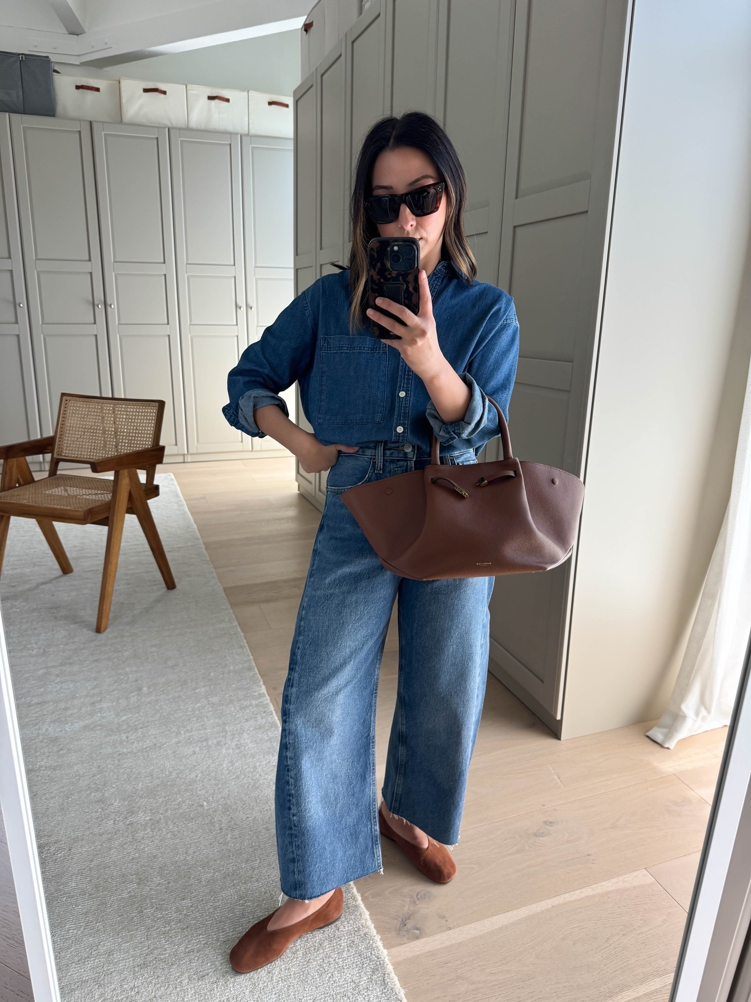 The jeans everyone said would be one-and-done — going on year 3. Love the wash on these they’re truly stunning! A true high-rise. Large barrel. Had to cut the hems. 

AYR denim shirt xs
AGOLDE Luna jeans 24, cut hems
Reformation flats 5 - run slightly small but these do stretch out with wear. 
DeMellier New York bag in medium
Celine sunglasses
Dorsey James necklace 15”
Electric Picks earrings

#LTKmomlife #LTKOver40 #LTKPetite