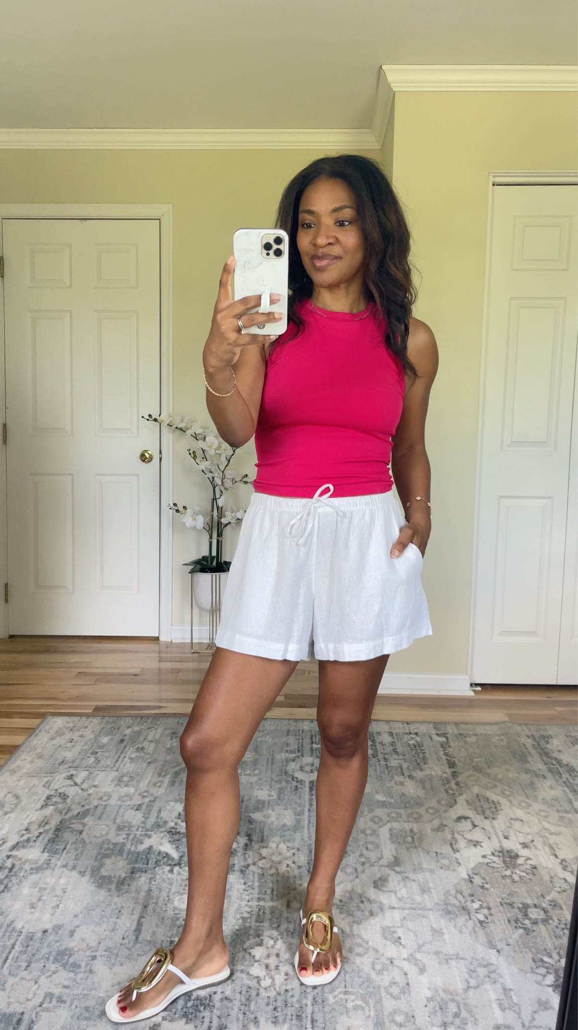 Wearing a medium in the top (I recommend sizing up at least two sizes if you have a large cup size like I do). And wearing a small in the shorts which are TTS  

y #ltkover40 #ltkgrwm #ltkootd